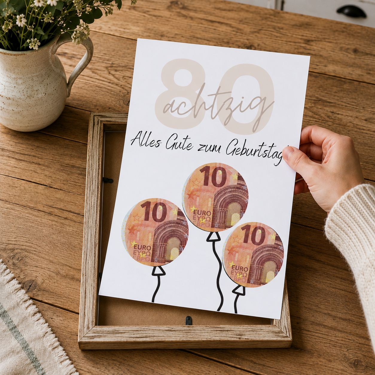 Geldgeschenk zum 80. Geburtstag als Printable mit Luftballons, großer Zahl 80, Geburtstagsgruß und ausschneidbaren Kreisen für Geldscheine im modernen Design