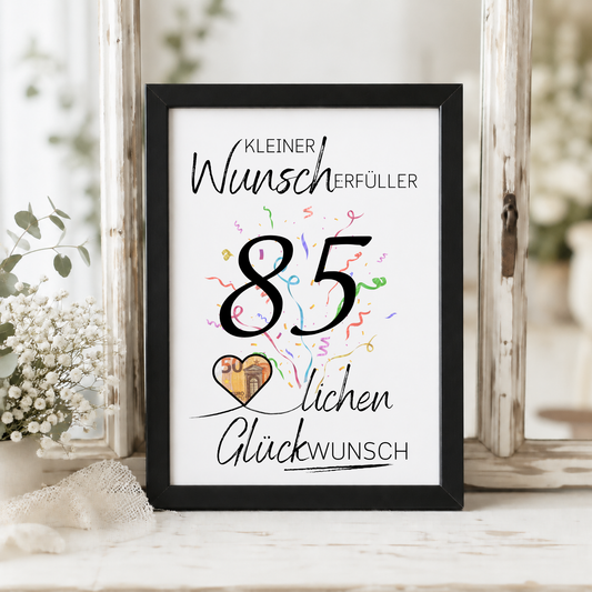 Geldgeschenk 85. Geburtstag Printable mit schwarzer Schrift, großem Schriftzug „85“, buntem Konfetti und Herzmotiv für Geldschein als Wunscherfüller zum Ausdrucken